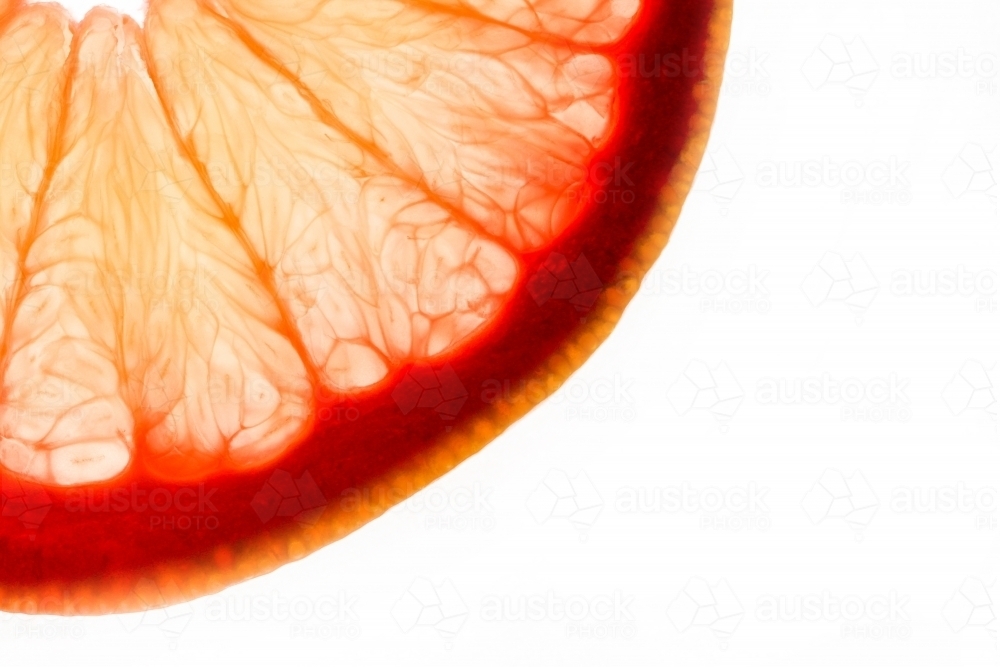 sliced orange on white background - Australian Stock Image