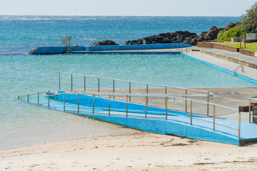 Sinking Ramp Pool Image of Sloping ramp and railings leading down into a ocean swimming ...