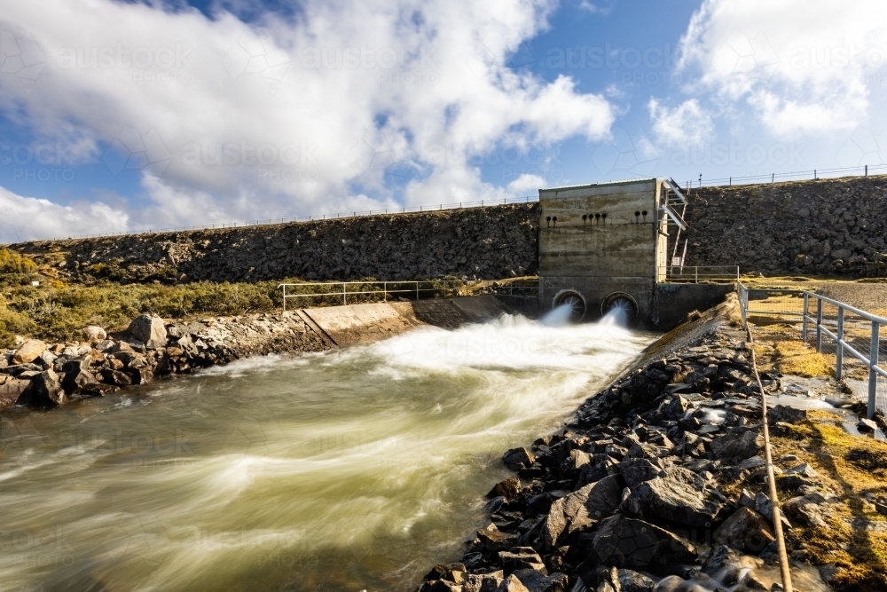 Slow exposure of water streaming from lake outlet - Australian Stock Image