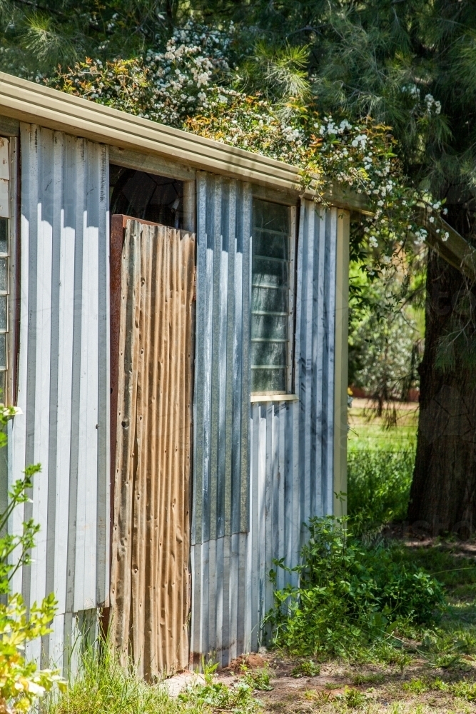 Small corrugated iron garden shed on a farm - Australian Stock Image