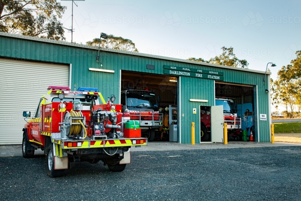 Small country fire truck parked at rural fire station ready for emergency - Australian Stock Image