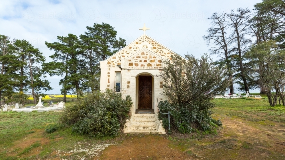 Small old stone church in the country - Australian Stock Image