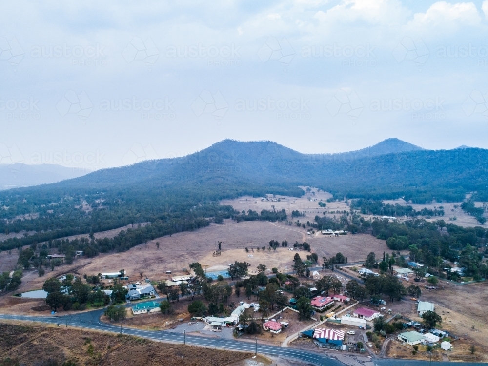 Small town of Bulga covered in smoke haze from backburning - Australian Stock Image