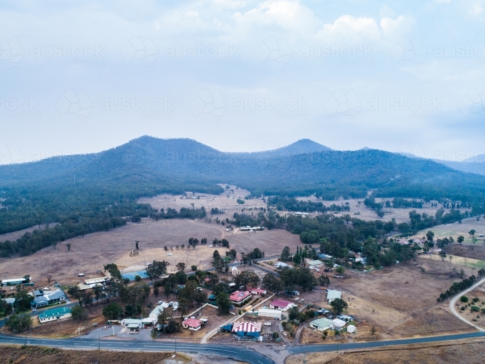 Small town of Bulga covered in smoke haze from backburning - Australian Stock Image