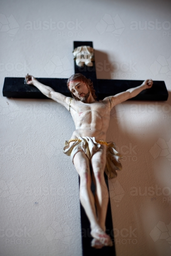 Small wooden crucifix of Jesus Christ - Australian Stock Image