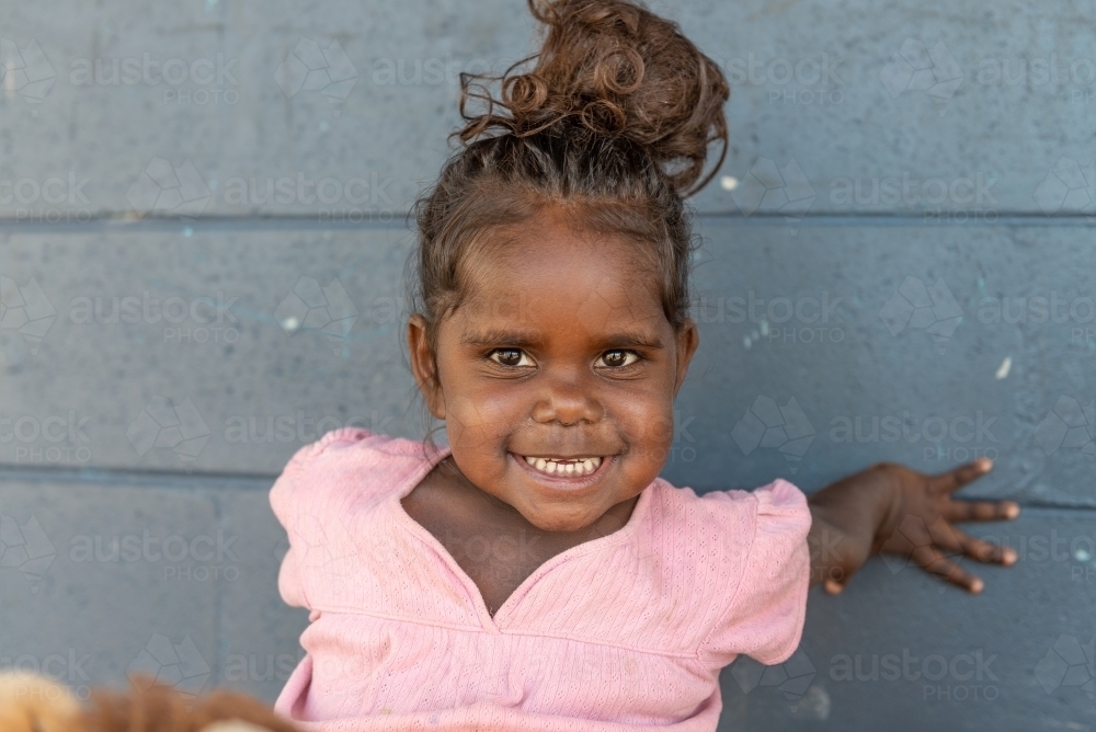 Smiling 3yo Aboriginal girl - Australian Stock Image