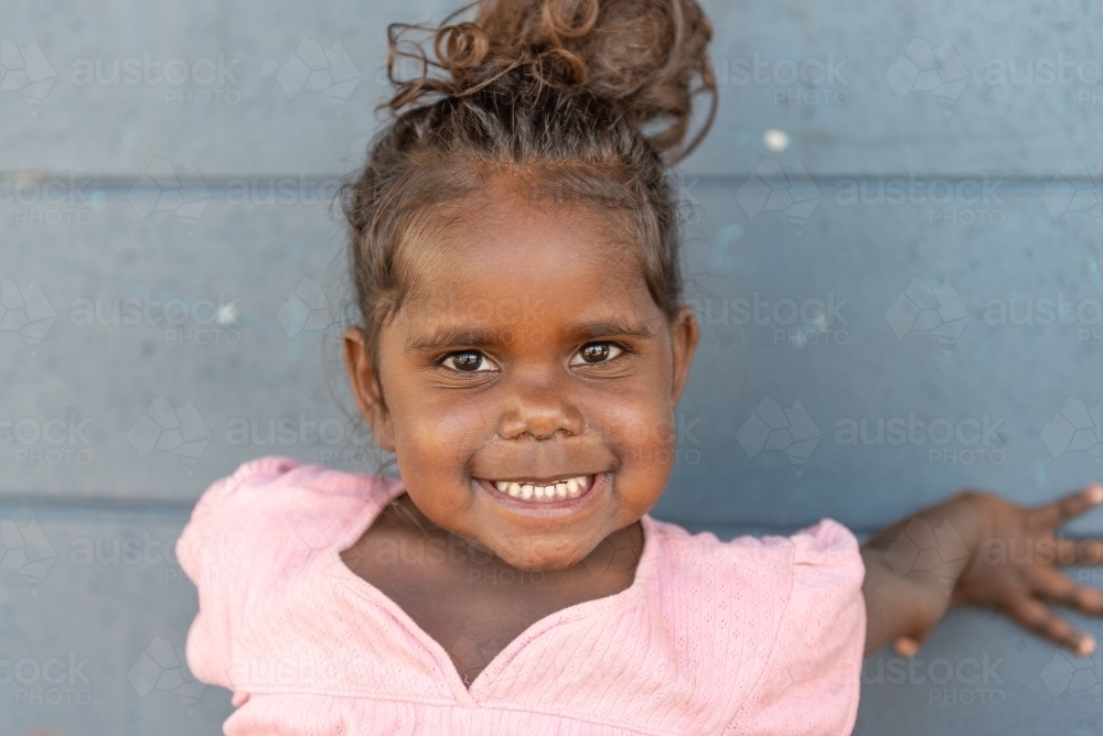 Smiling 3yo Aboriginal girl - Australian Stock Image