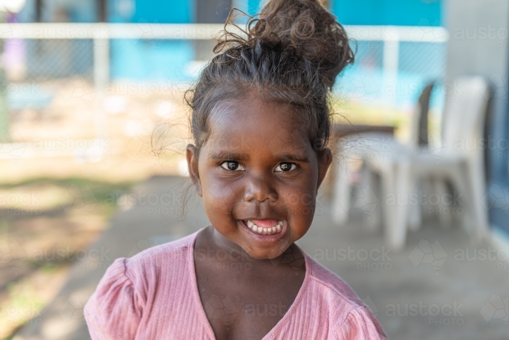 Smiling 3yo Aboriginal girl - Australian Stock Image