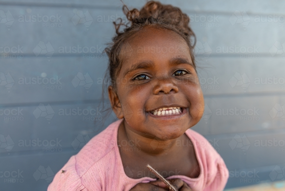 Smiling 3yo Aboriginal girl - Australian Stock Image