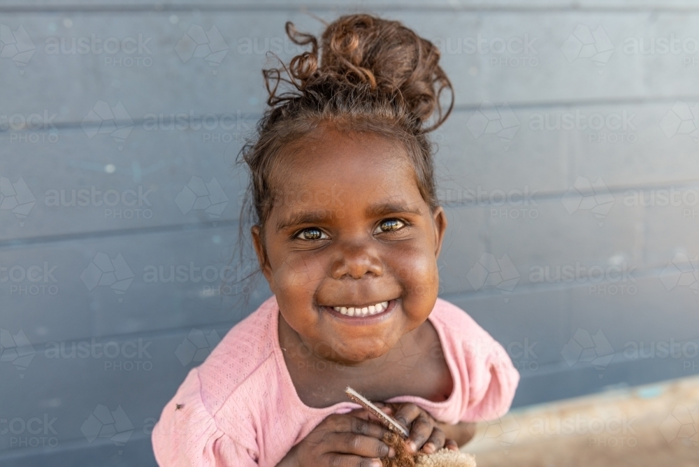 Smiling 3yo Aboriginal girl - Australian Stock Image