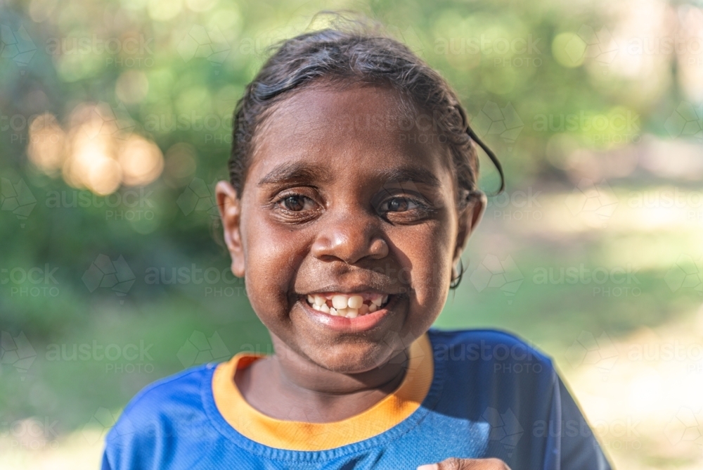 Smiling aboriginal girl - Australian Stock Image