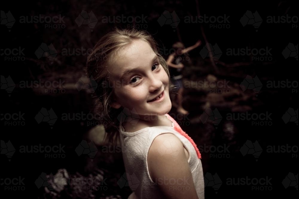 Smiling girl at the creek - Australian Stock Image