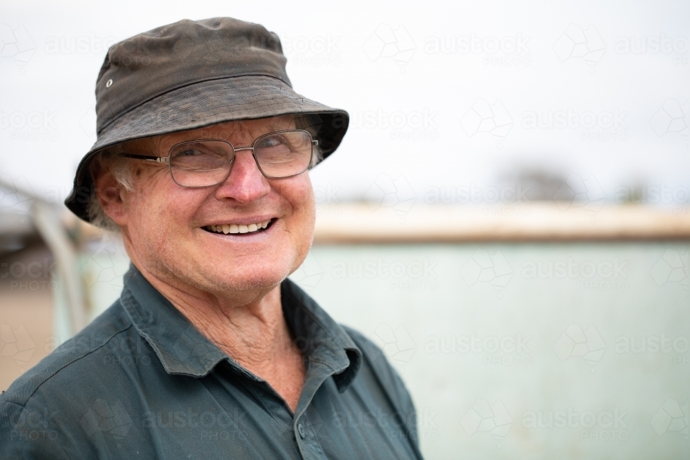 smiling happy short-sighted old bloke - Australian Stock Image