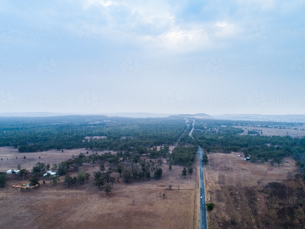 Smoke filled hazy skies over landscape near Putty - Australian Stock Image