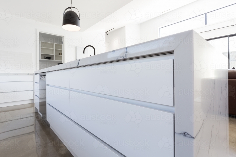 Soft close kitchen drawer close up in luxury home - Australian Stock Image
