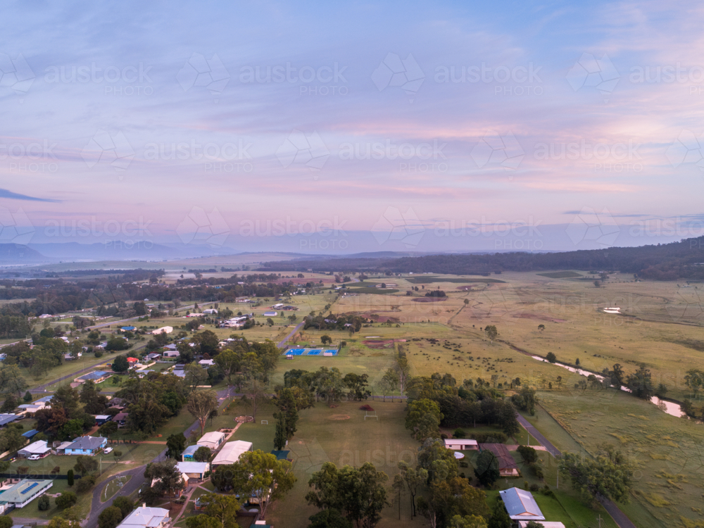 Soft dawn sky over peaceful rural village in New South Wales Australia - Australian Stock Image