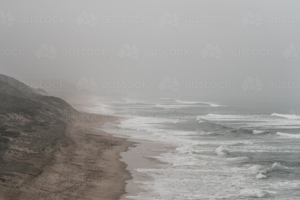 soft winters sea mist along the coastline - Australian Stock Image