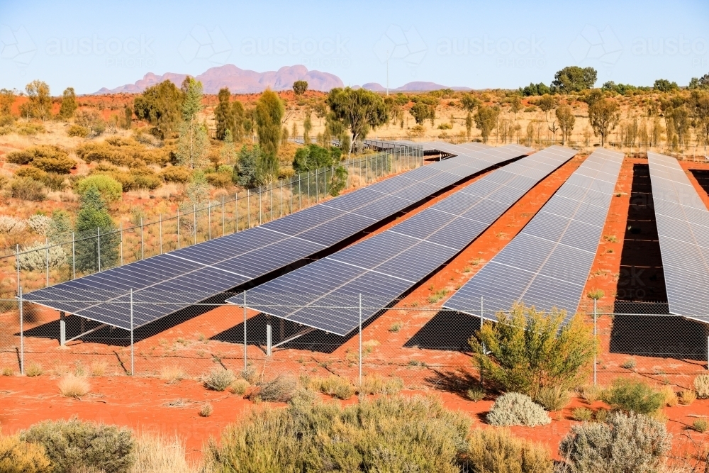 Solar panel farm in outback destination beneath blue sunny sky - Australian Stock Image