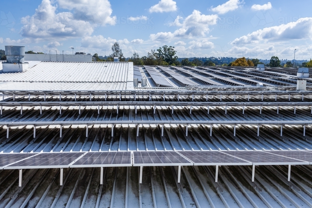 Solar panels on rooftop of shopping mall - Australian Stock Image