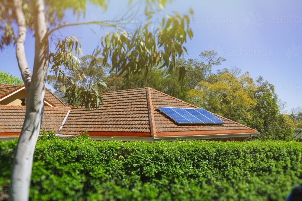 Solar panels on suburban roof - Australian Stock Image