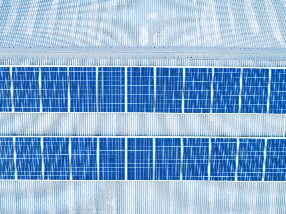 Solar Panels on tin roof of farm shed viewed from above - Australian Stock Image