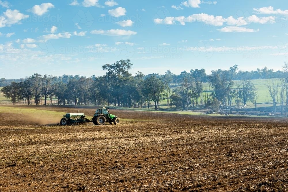 Sowing crop with tractor and combine seeder - Australian Stock Image