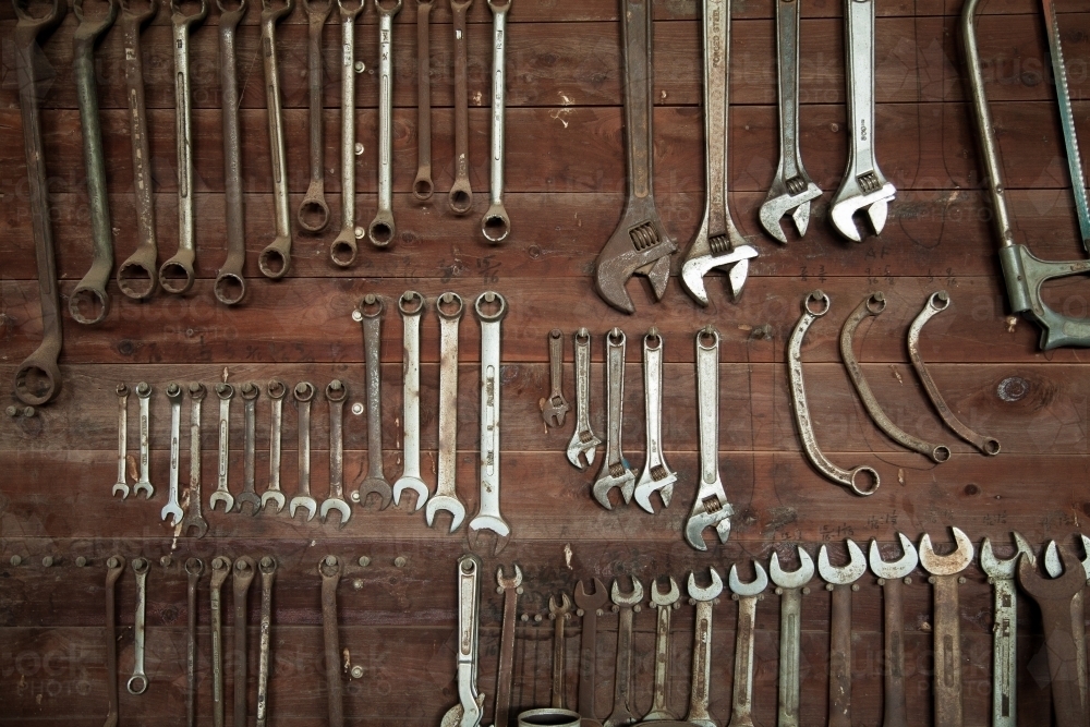 Spanners hanging on a tool board in a shed - Australian Stock Image