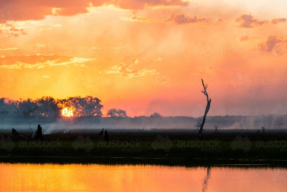 Spectacular sunset through the fire and smoke - Australian Stock Image