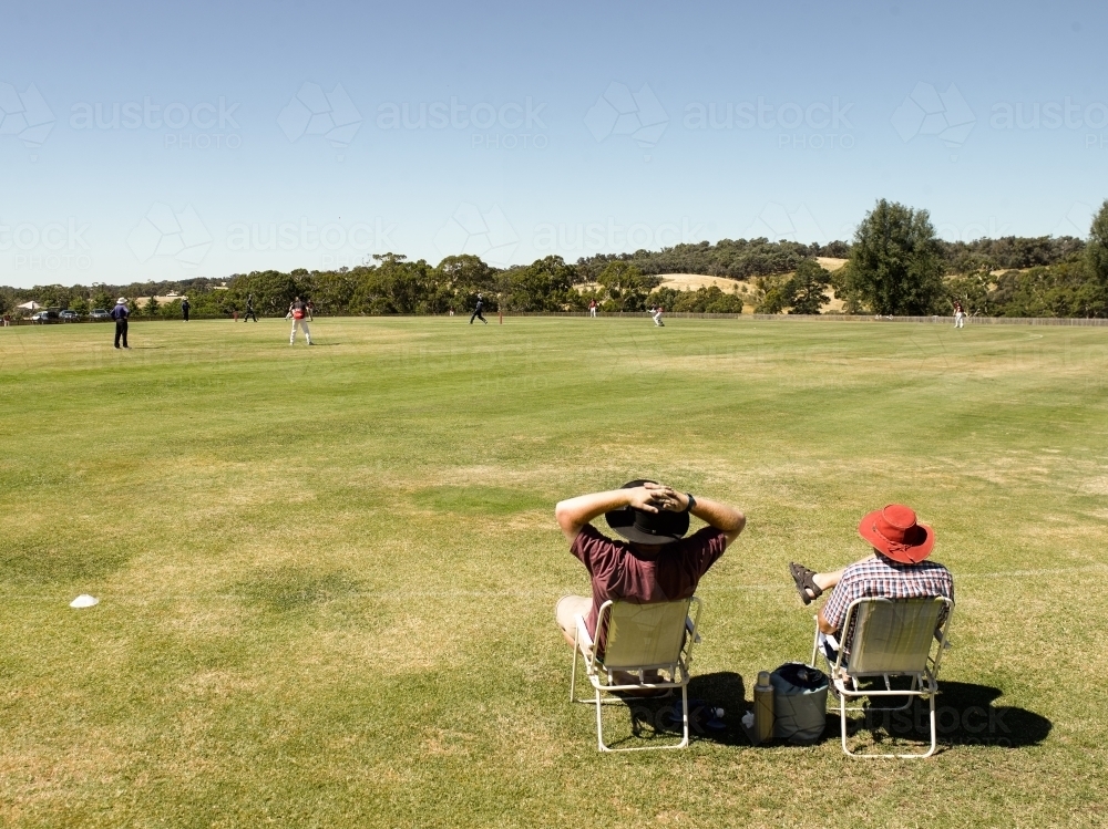 Spectators at a T20 cricket match in the country - Australian Stock Image