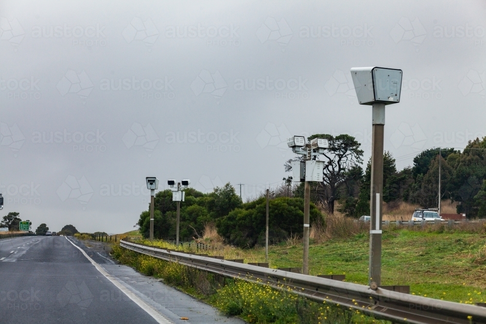 Speed cameras on roadside of highway - Australian Stock Image