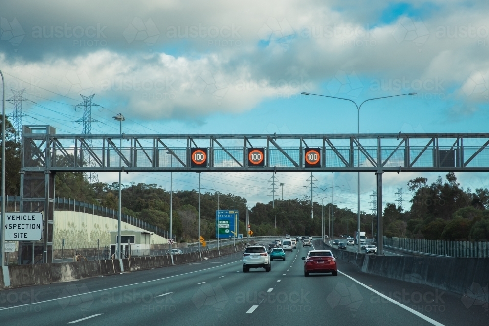 Image of speed limit 100 - Austockphoto