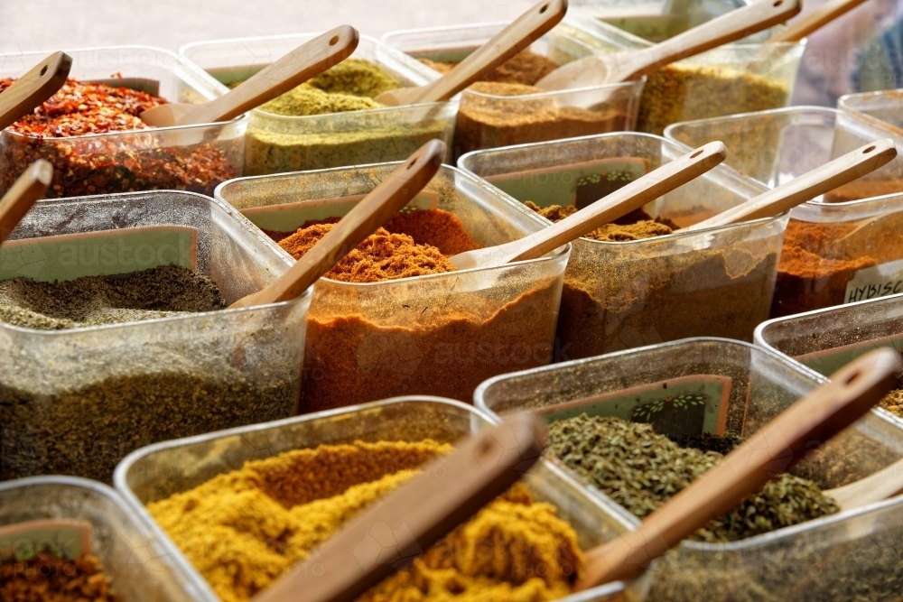 Spices and condiments for sale at Redcliffe Sunday market - Australian Stock Image