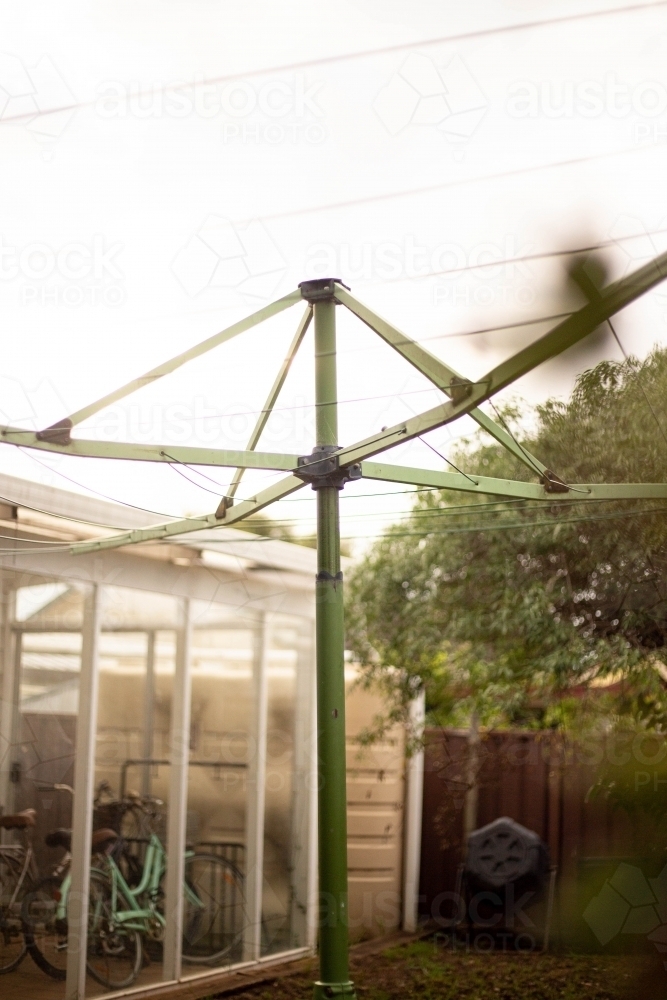 Spinning clothes line in backyard - Australian Stock Image