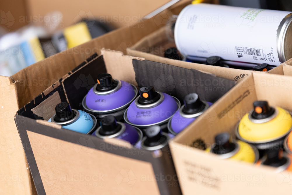Spray paint colours in box - Australian Stock Image