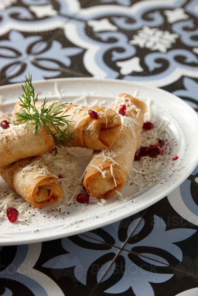 Spring rolls shredded with cheese - Australian Stock Image