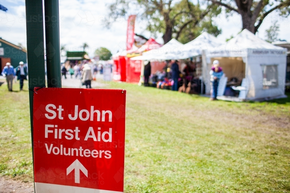 St John First Aid volunteers sign at country show event - Australian Stock Image
