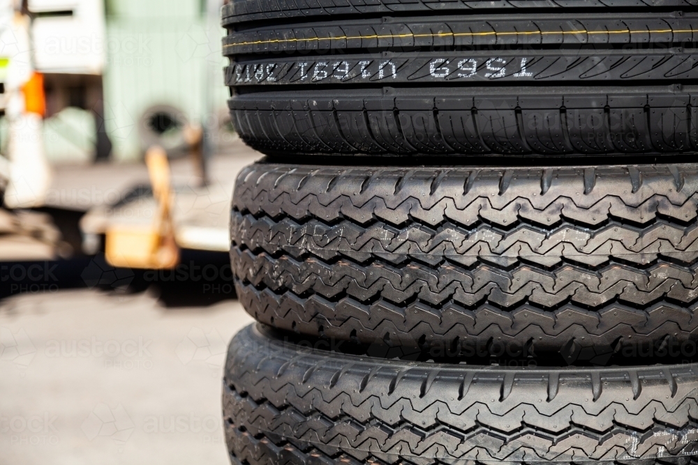 Stack of new and used car tyres - Australian Stock Image