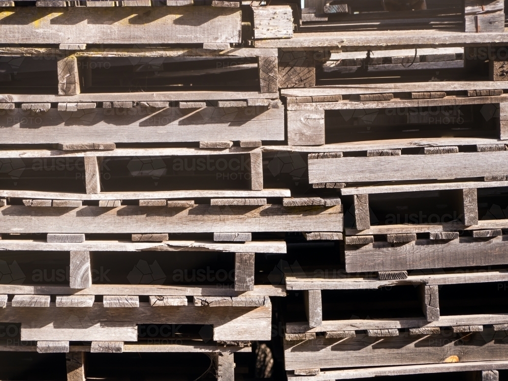 Stack of weathered old wooden pallets - Australian Stock Image