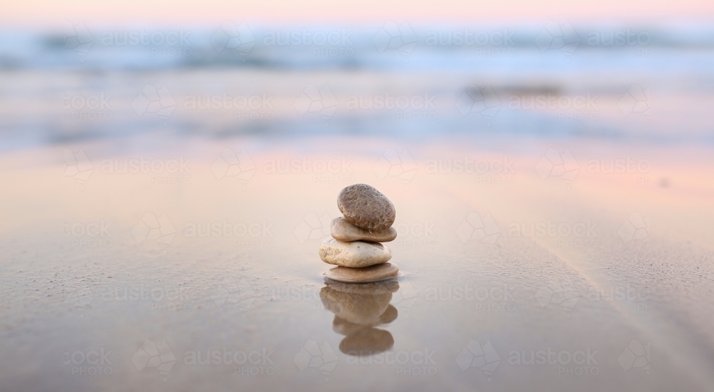 Stacked Pebbles in the sea - Australian Stock Image