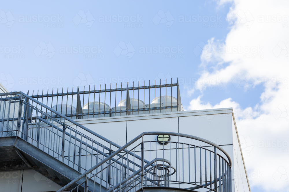 stairs and handrails up to top of building - Australian Stock Image