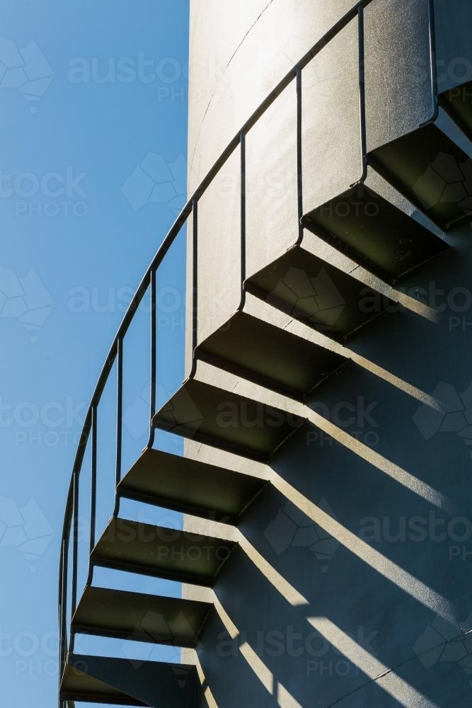 Stairs winding up around a tower - Australian Stock Image