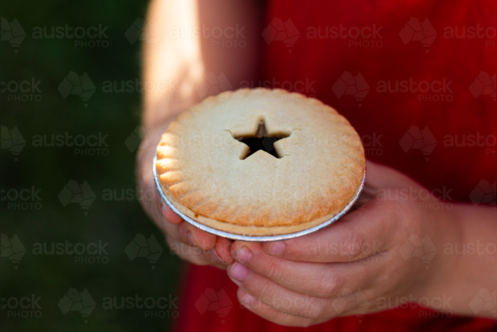 Image of Star shape on fruit mince pie food held in little girls hands ...