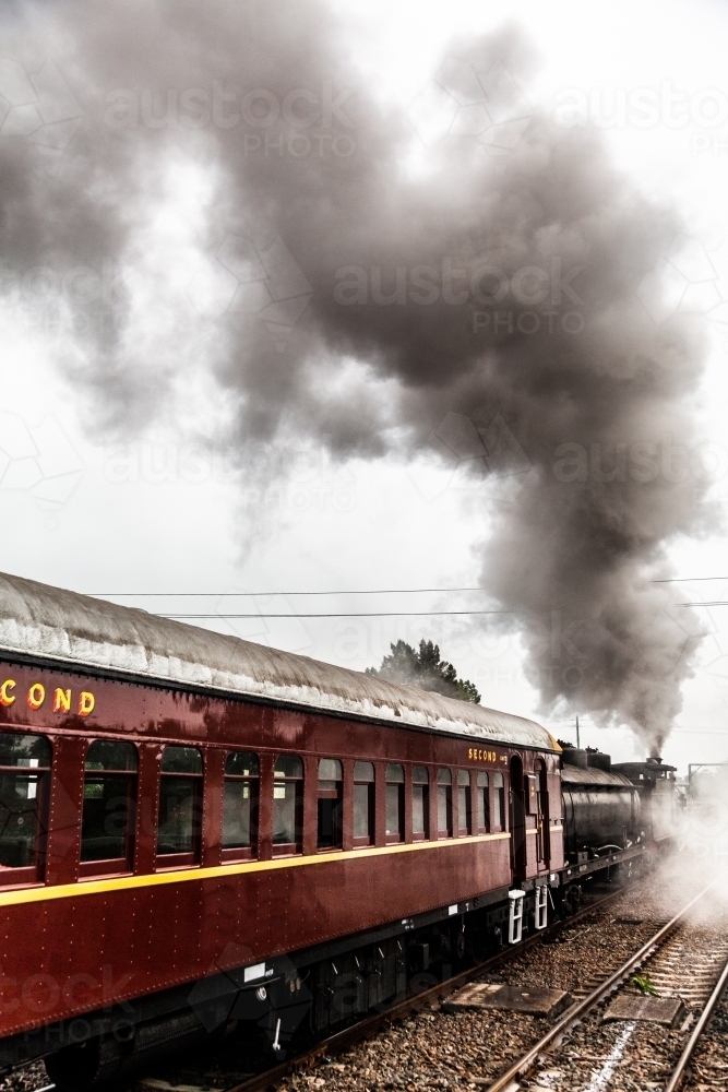 Steam train engine at Steamfest pulling out of the train station in Maitland - Australian Stock Image