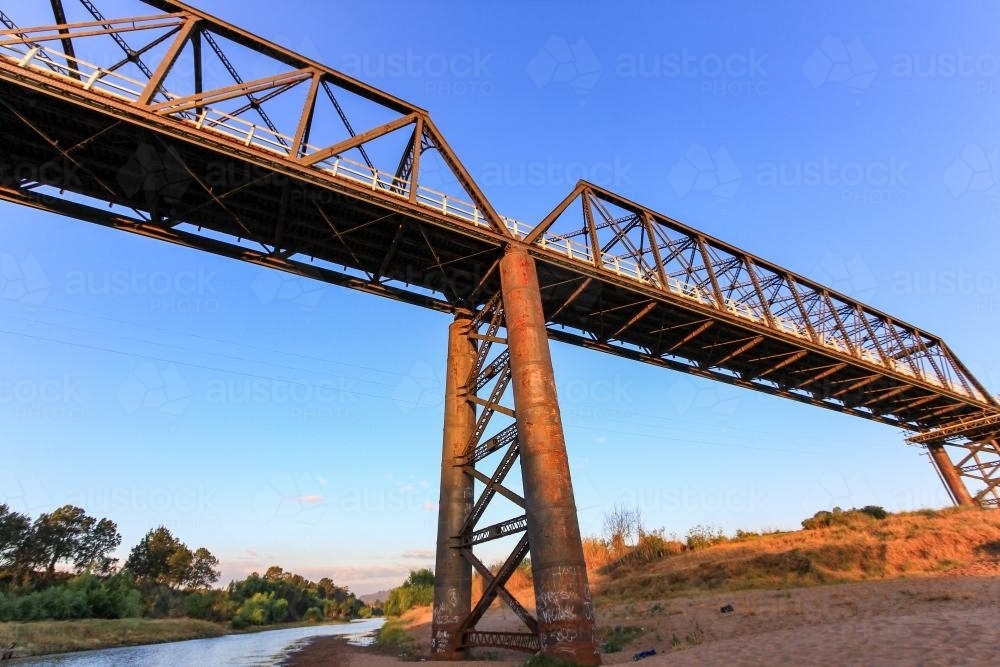 Steel bridge over river - Australian Stock Image