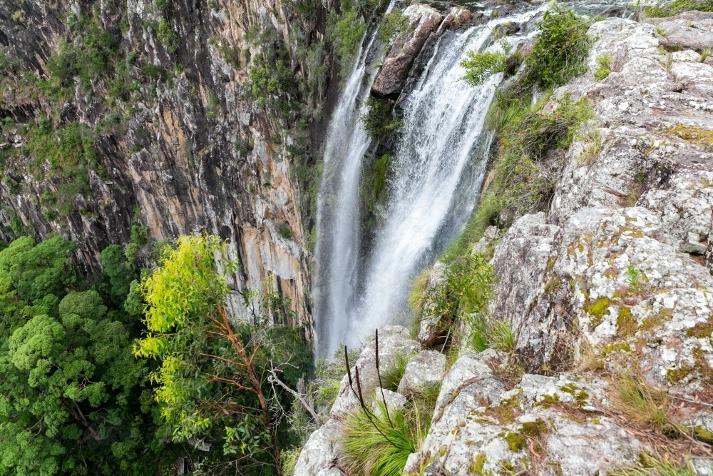 Steep rock face of Whian Whian Falls - Australian Stock Image