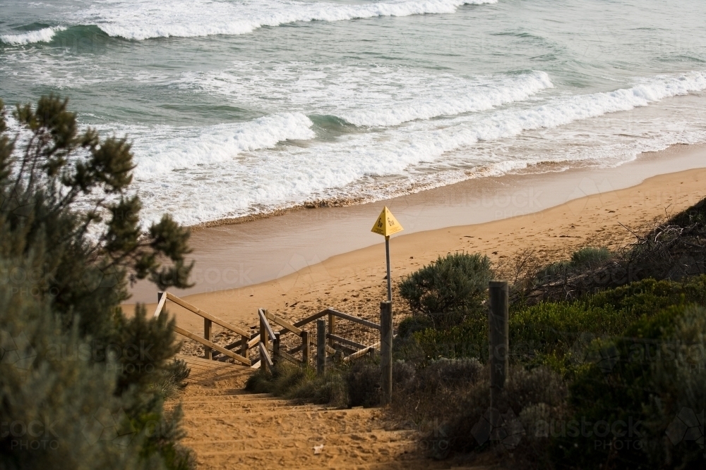 steep steps leading down to a surf beach - Australian Stock Image