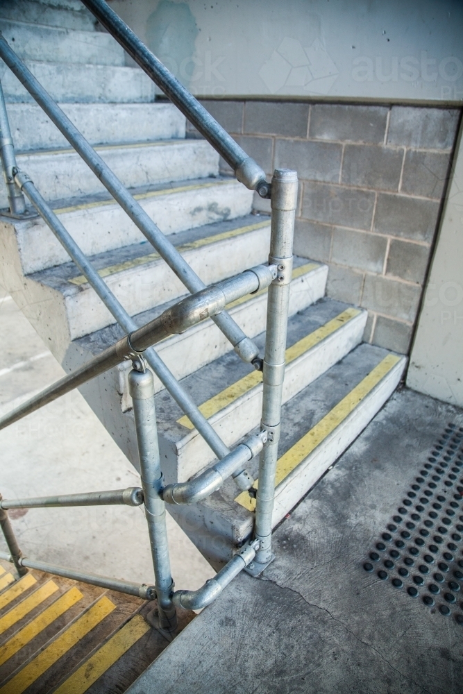 Steps leading to the upper and lower levels of a car park - Australian Stock Image