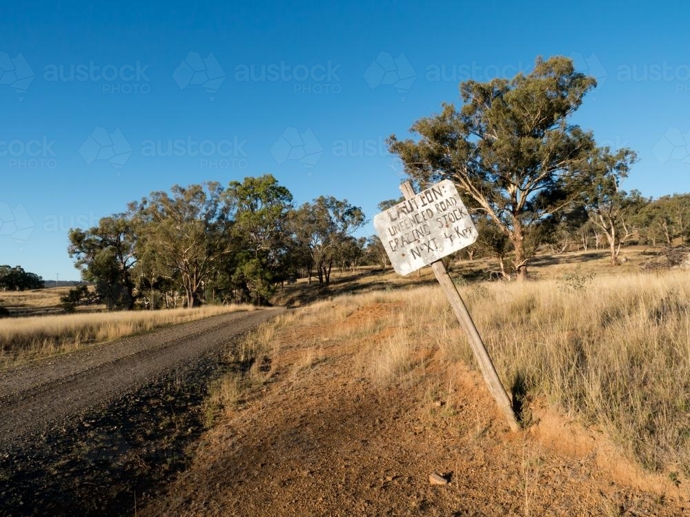 Stock sign on an unfenced country dirt road - Australian Stock Image