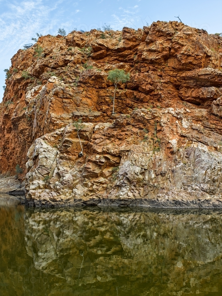 Stone cliffs and pool at Ormiston Gorge and Pound West MacDonnell Ranges - Australian Stock Image