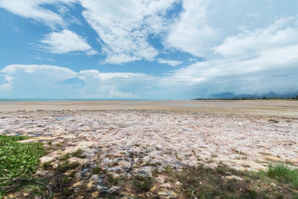 Storm Approaching across rocky shoreline - Australian Stock Image